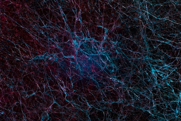 Macrofotografía de fondo abstracto rojo con textura de moho Filamentos de moho y cristales como una red neuronal