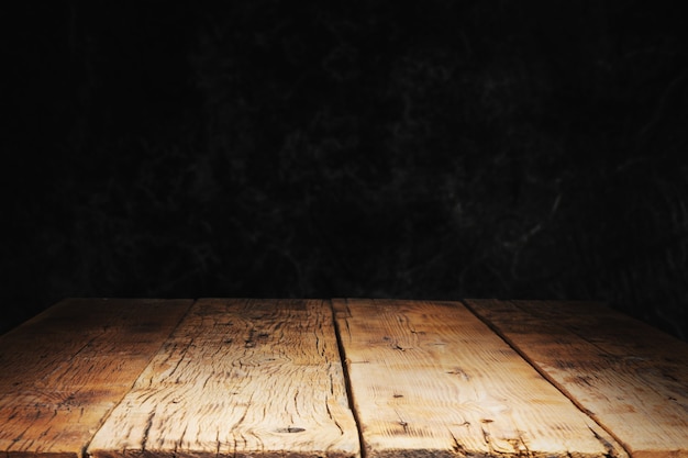 Foto madera con mesa de textura de hormigón de piedra negra