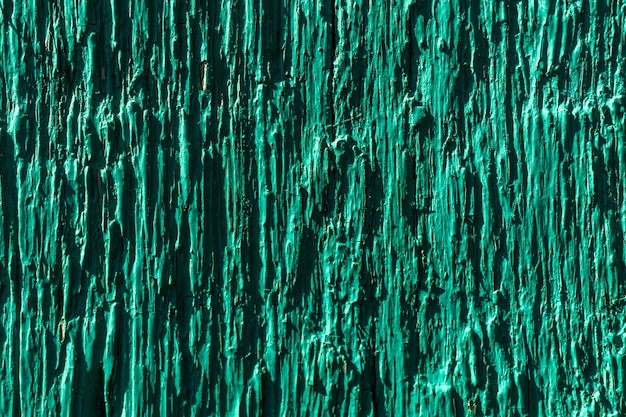 Madera pintada en color verde textura de fondo closeup ver foto