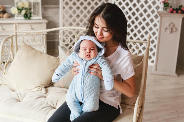 Foto madre y hija felices, bebé.