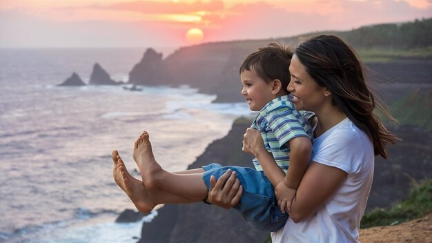 Foto madre y su hijo pequeño sentados en el acantilado