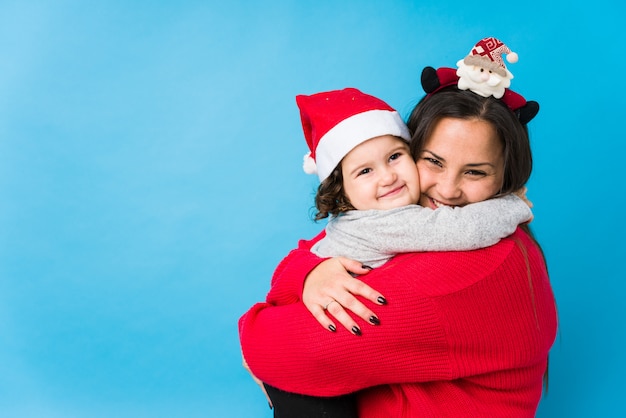 Mãe e bebê, aproveitando o dia de natal