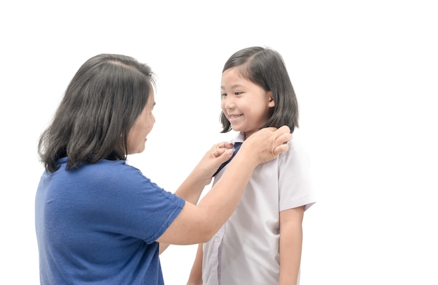 Mãe, vestindo, uniforme, estudante, dela, filha