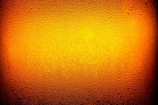 Makro-BierflaschentexturDie Textur des Wassers, das auf die Bierflasche tropft