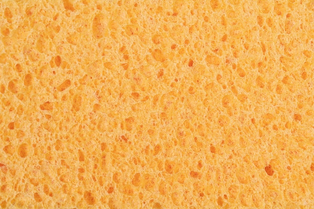 Makrobild eines gelben schwamms struktur eines viskoseschwamms draufsicht schwamm detaillierte textur