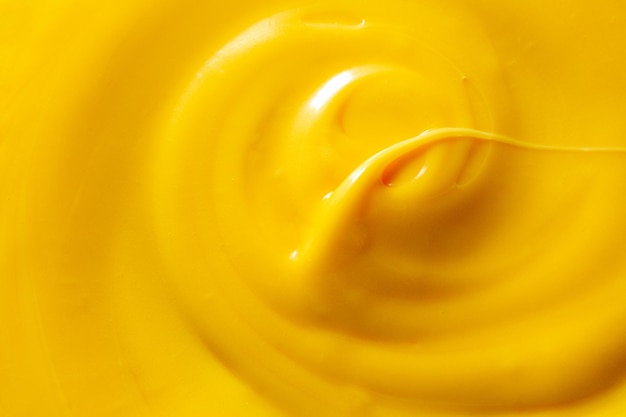 Makrobutter, Buttertexturhintergrund, Nahaufnahme der geöffneten gelben Butter