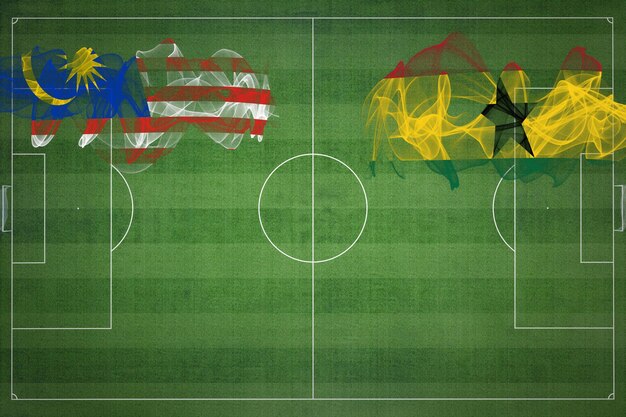 Malásia vs Gana Jogo de futebol cores nacionais bandeiras nacionais campo de futebol jogo de futebol Conceito de competição Copiar espaço