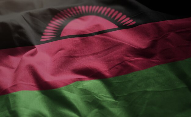 Malawi-Flagge zerknittert nah oben