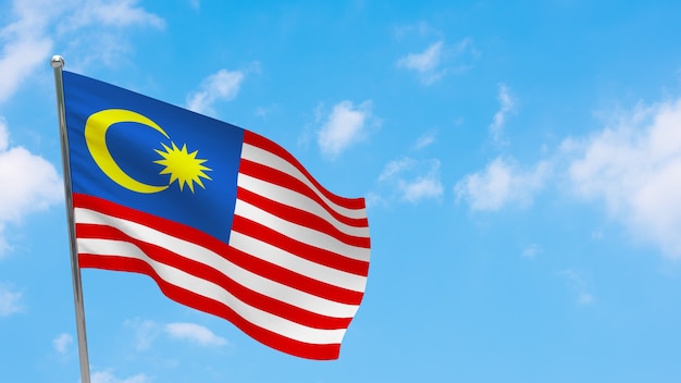 Malaysia Flagge auf Pole. Blauer Himmel. Nationalflagge von Malaysia