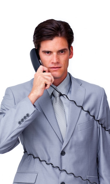 Malestar empresario enredar en los cables del teléfono