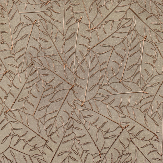 Foto malha de ouro e prata sem costura sob a forma de folhas de plantas no fundo do cimento de pedra mármore