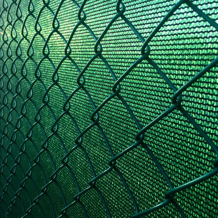 Malha e cerca verde
