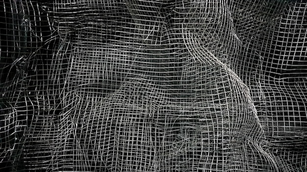 Malla arrugada. Fondo abstracto. Malla metálica con sombra sobre un fondo negro. La superficie de un rollo grande está dañada por una malla de alambre.