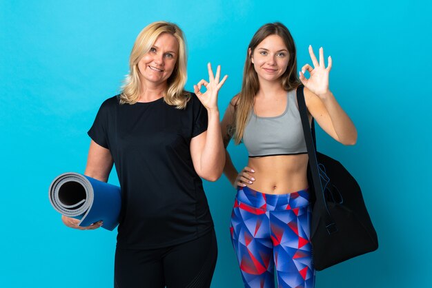 Mamá e hija en ropa deportiva