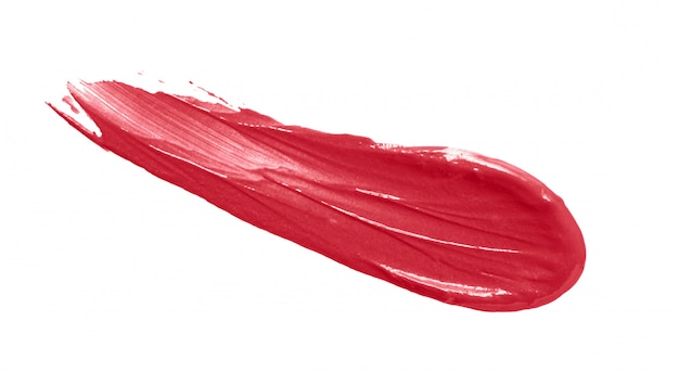 Mancha de lápiz labial rojo aislada en blanco