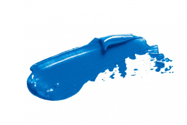 Mancha de muestra de maquillaje azul mancha aislada en blanco, textura de lápiz labial