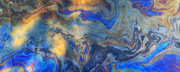 Mancha multicolor de gasolina de fondo abstracto, abstracto derrame de petróleo sobre el agua