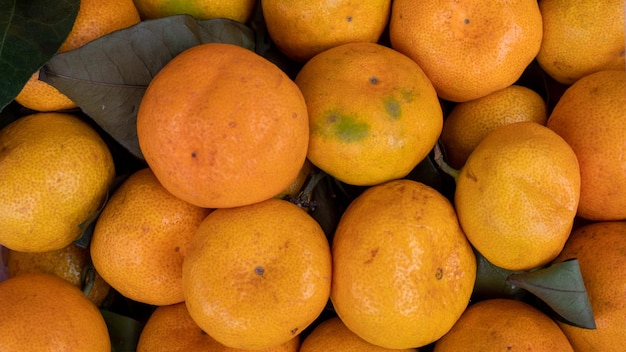 mandarinas maduras en el mercado de fondo