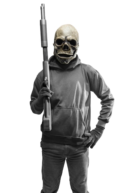 Foto mann mit einem totenkopfkostüm für halloween mit waffe