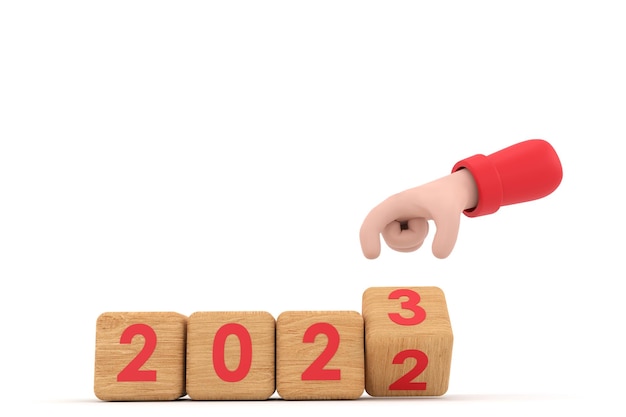 Mano y cubos con 2022 23 representa el nuevo año 2023