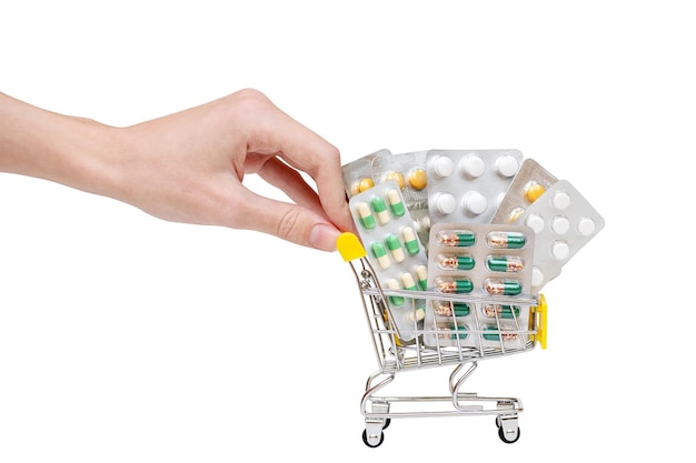 Una mano está recogiendo un carrito de pastillas de un carrito de compras.