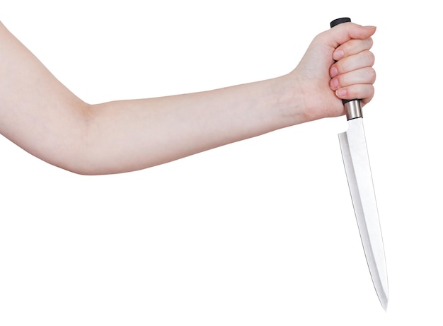Foto mano femenina con cuchillo de cocina grande