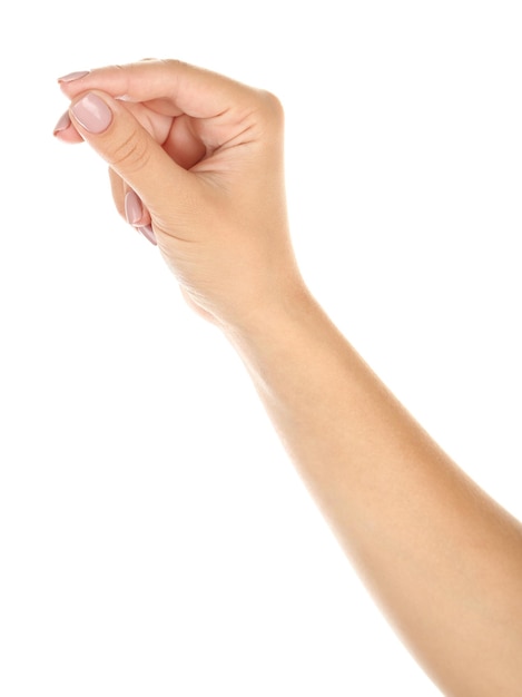 Foto mano femenina sosteniendo algo aislado en blanco