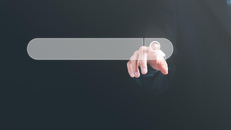 Foto la mano del hombre apuntando al icono de búsqueda muestra una búsqueda de lo que le interesa search technolo
