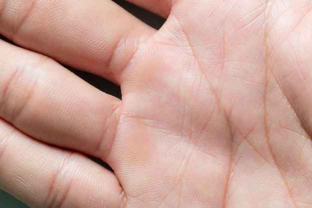 mano humana macroImagen macro de la textura de la superficie de la palma humanaCerrar la textura de la piel con wri