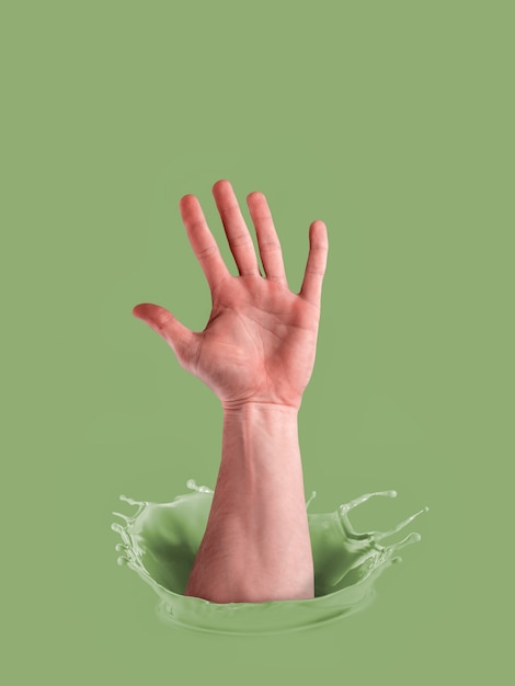Foto mano masculina en pintura. concepto de votación.