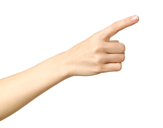 La mano de la mujer apuntando aislado sobre fondo blanco.