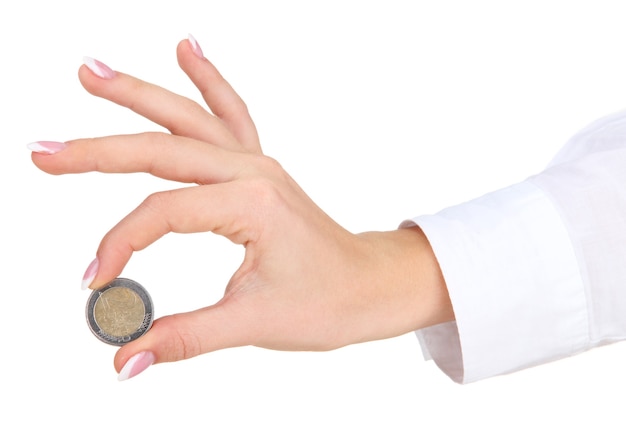 Foto mano de mujer con moneda euro, aislado en blanco