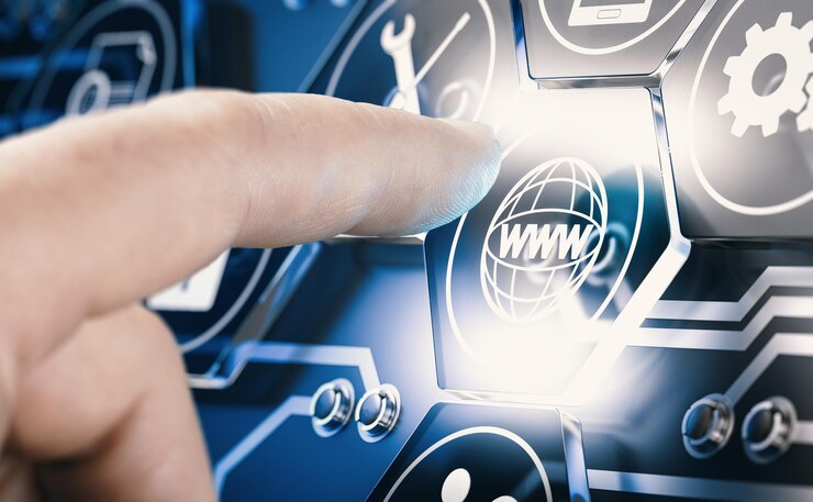 Foto mano presionando un botón digital con pictograma www sobre fondo azul. concepto de tecnología web futurista. imagen compuesta entre una fotografía de mano y un fondo 3d.