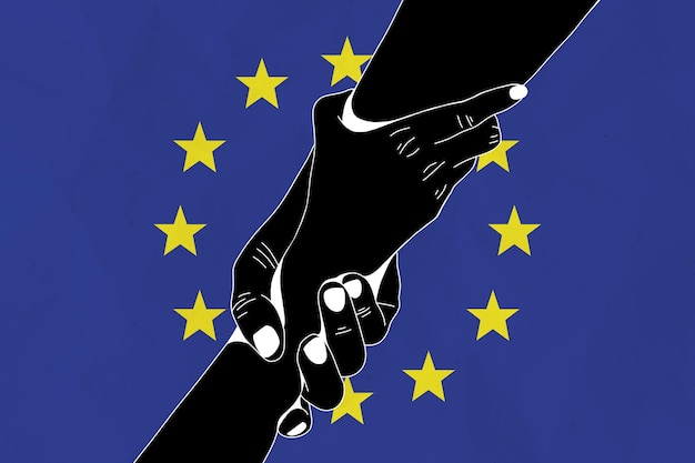 La mano que ayuda contra la bandera de la Unión Europea El concepto de apoyo Dos manos que se toman unas a otras Una mano que ayuda a los heridos en los combates Dar una mano