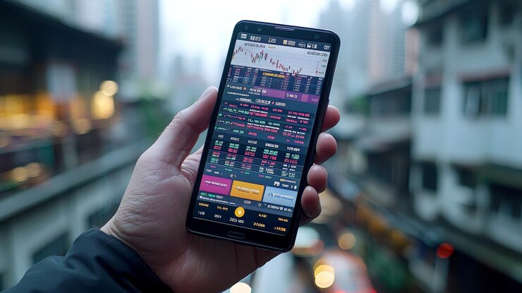 Foto una mano sostiene un teléfono inteligente que muestra datos del mercado de valores con un paisaje urbano borroso en el fondo