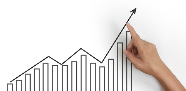 Mano tocando un gráfico de indicador financiero y gráfico de análisis de economía de mercado contable