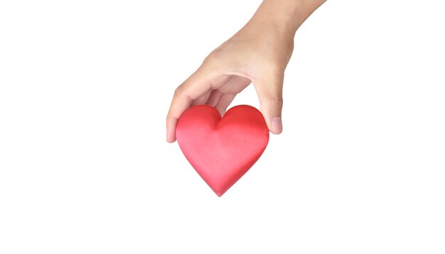 Manos sosteniendo un corazón rojo. conceptos de donación de salud del corazón