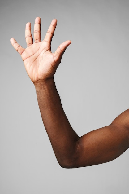 Mans arm raised in the air