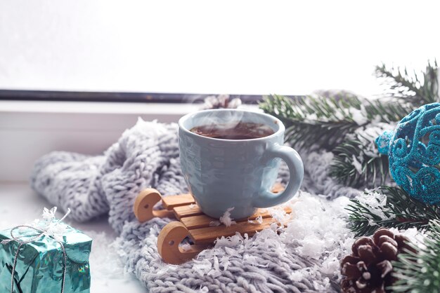 Manta con una taza de café