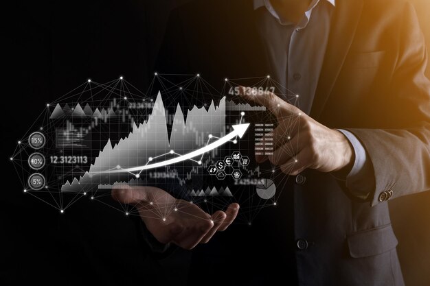 Mantenga a mano los datos de ventas y el gráfico de crecimiento económico. Planificación y estrategia empresarial. Analizando el trading de intercambio. Financiero y bancario. Tecnología de marketing digital Plan de ganancias y crecimiento.