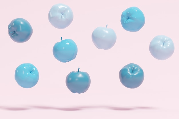 Manzanas azules que flotan en el fondo en colores pastel de los rosas.