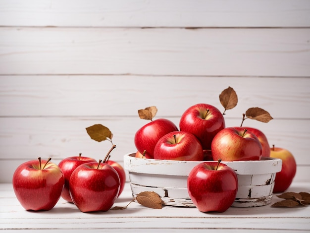 Foto manzanas rojas sobre un fondo de madera blanca