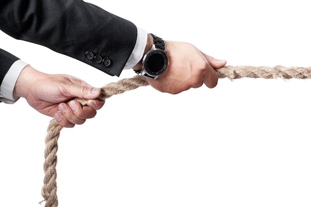 Foto mão de empresário puxando a corda
