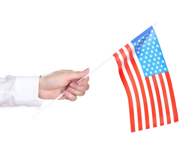 Mão feminina com bandeira americana isolada em branco