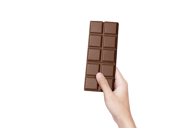 Mão humana com barra de chocolate isolada sobre fundo branco