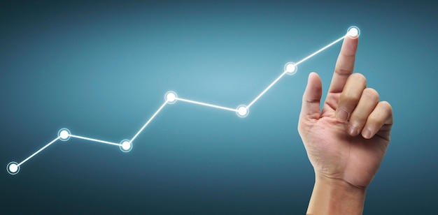 Mão tocando gráficos de indicador financeiro e gráfico de análise de economia de mercado contábil