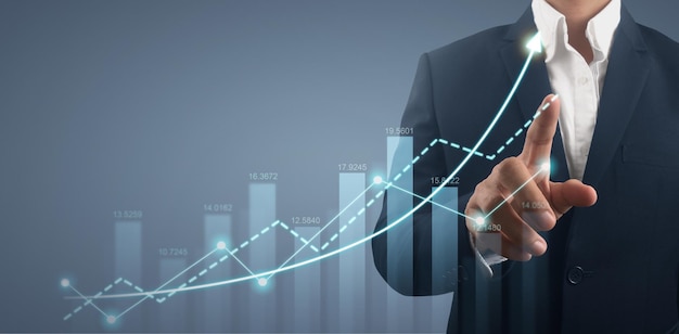 Mão tocando gráficos do gráfico de análise de mercado de indicadores financeiros