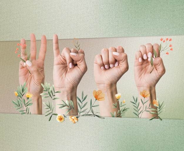 Foto mãos florais usando linguagem de sinais