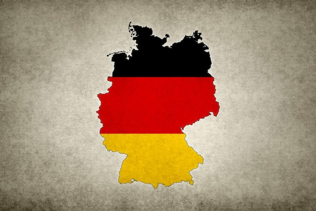 Mapa de Alemania con su bandera en un papel viejo