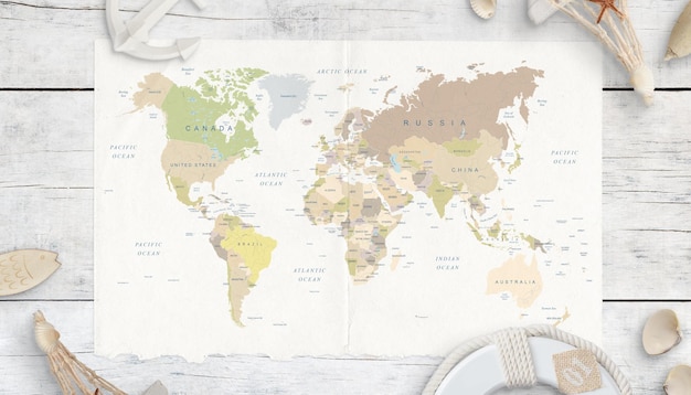 Foto mapa do mundo na mesa de madeira branca mapa de conceito de viagem cercado com cinto de segurança de âncora de conchas e lembranças vista superior